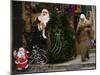 Palestinian Woman Walks Past Christmas Decorations at a Shop in Jerusalem's Old City-null-Mounted Photographic Print