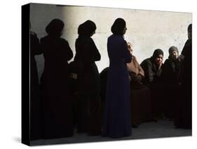 Palestinian Women Sit as They Mourn During the Funeral of Four Al-Aqsa Martyrs' Brigades Militants-null-Stretched Canvas