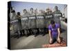 Palestinian Worshipper Prays Outside Jerusalem's Old City While Israeli Forces Stand Guard-null-Stretched Canvas