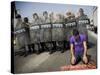 Palestinian Worshipper Prays Outside Jerusalem's Old City While Israeli Forces Stand Guard-null-Stretched Canvas