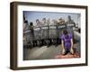 Palestinian Worshipper Prays Outside Jerusalem's Old City While Israeli Forces Stand Guard-null-Framed Photographic Print