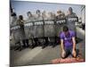 Palestinian Worshipper Prays Outside Jerusalem's Old City While Israeli Forces Stand Guard-null-Mounted Photographic Print