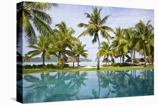 Palm Trees Reflect In The Pool At The Four Seasons Bora Bora-Karine Aigner-Stretched Canvas