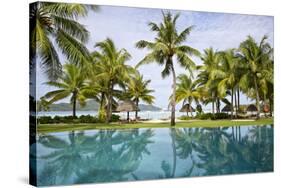 Palm Trees Reflect In The Pool At The Four Seasons Bora Bora-Karine Aigner-Stretched Canvas