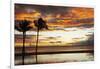 Palm trees silhouetted against red clouds during sunset over a beach at Flic en Flac-Stuart Forster-Framed Photographic Print