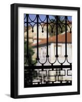 Palms and Red-roofed Buildings Through Iron Grillwork, Lisbon, Portugal-Merrill Images-Framed Photographic Print