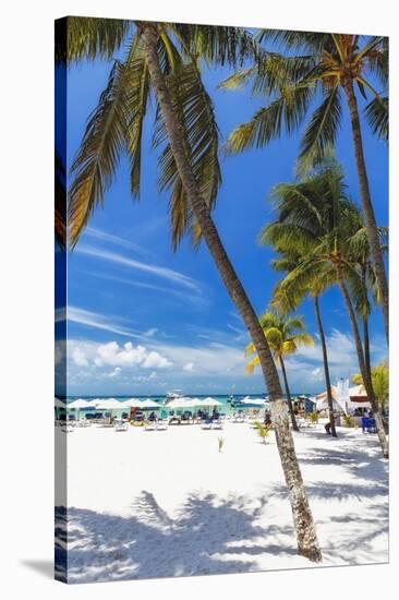 Palms and Umbrellas, Isla Mujeres, Mexico-George Oze-Stretched Canvas