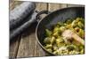 Pan-Fried Brussels Sprouts in Cast-Iron Frying Pan on Wooden Table-Jana Ihle-Mounted Photographic Print