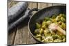 Pan-Fried Brussels Sprouts in Cast-Iron Frying Pan on Wooden Table-Jana Ihle-Mounted Photographic Print