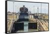 Panamax-sized container ship goiing up through Gatun Locks on Panama Canal, Panama, Central America-Tony Waltham-Framed Stretched Canvas