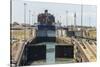 Panamax-sized container ship goiing up through Gatun Locks on Panama Canal, Panama, Central America-Tony Waltham-Stretched Canvas