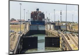 Panamax-sized container ship goiing up through Gatun Locks on Panama Canal, Panama, Central America-Tony Waltham-Mounted Photographic Print