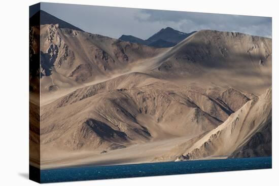 Pangong lake, 4350m high and 134 km long, extends from India to Tibet, Ladakh, India-Alex Treadway-Stretched Canvas