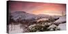 Panorama of frozen sea surrounded by snow framed by the orange sky at sunset, Torsken, Senja, Troms-Roberto Moiola-Stretched Canvas