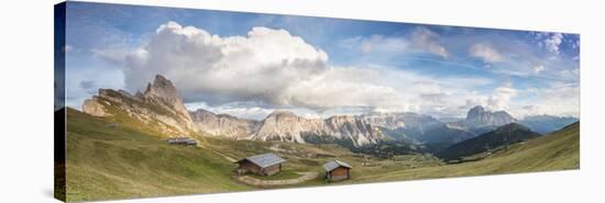 Panorama of green meadows and huts of the Odle mountain range seen from Seceda, Val Gardena, Trenti-Roberto Moiola-Stretched Canvas