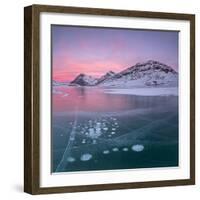 Panorama of ice bubbles and frozen surface of Lago Bianco at dawn, Bernina Pass, canton of Graubund-Roberto Moiola-Framed Photographic Print