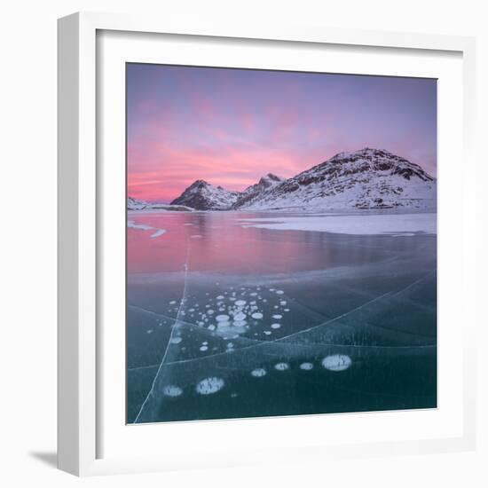 Panorama of ice bubbles and frozen surface of Lago Bianco at dawn, Bernina Pass, canton of Graubund-Roberto Moiola-Framed Photographic Print