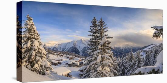 Panorama of Snowy Woods and Mountain Huts Framed by Sunset, Bettmeralp, District of Raron-Roberto Moiola-Stretched Canvas