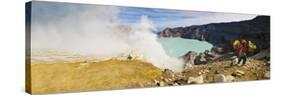 Panorama of Sulphur Worker Appearing Out of Toxic Fumes at Kawah Ijen Volcano, East Java, Indonesia-Matthew Williams-Ellis-Stretched Canvas