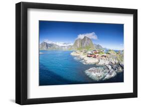 Panorama of the fishing village framed by blue sea and high peaks, Hamnoy, Moskenesoya, Nordland co-Roberto Moiola-Framed Photographic Print