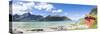 Panorama of the turquoise sea surrounded by peaks and typical house of fishermen, Strandveien, Lofo-Roberto Moiola-Stretched Canvas