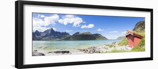 Panorama of the turquoise sea surrounded by peaks and typical house of fishermen, Strandveien, Lofo-Roberto Moiola-Framed Photographic Print