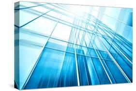 Panoramic and Perspective Wide Angle View to Steel Blue Background of Glass High Rise Building-Vladitto-Stretched Canvas