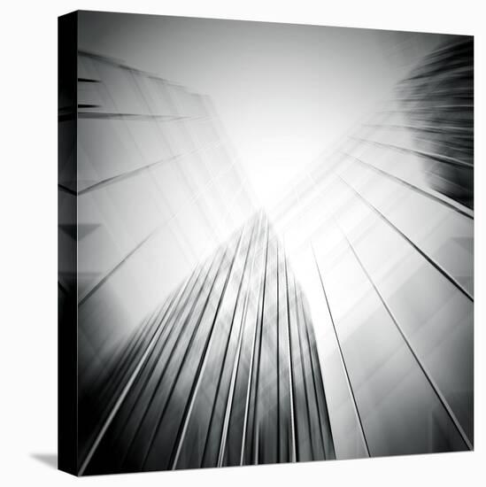 Panoramic And Perspective Wide Angle View To Steel Blue Background Of Glass High Rise Building-Vladitto-Stretched Canvas