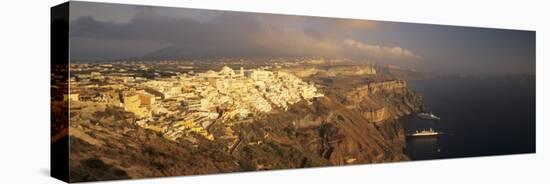 Panoramic Image of Fira in the Evening-Markus Lange-Stretched Canvas