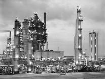 1950s NIGHT SHOT OF OIL REFINERY LIGHTS ON PETROCHEMICAL INDUSTRY GASOLINE FOSSIL FUEL TIDEWATER...-Panoramic Images-Photographic Print