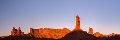 Rock formations in desert at sunset, Valley of the Gods, Colorado Plateau, Great Basin Desert, U...