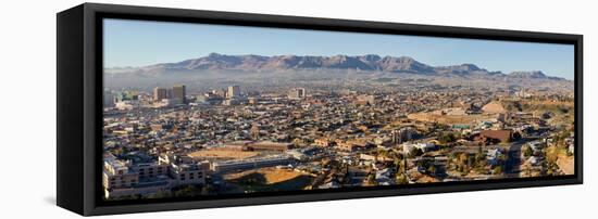 Panoramic view of skyline and downtown of El Paso Texas looking toward Juarez, Mexico-null-Framed Stretched Canvas