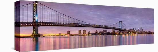 Panoramic View of the Ben Franklin Bridge and Philadelphia Skyline, under a Purple Sunset-Mihai Andritoiu-Stretched Canvas