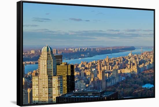 Panoramic views of New York City and Hudson River at sunset looking toward Central Park from Roc...-null-Framed Stretched Canvas