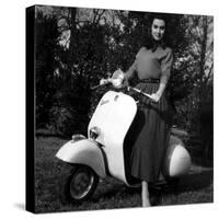 Paola Mori on a Vespa During Her Honeymoon with Orsonwelles in South of France, May 1955-null-Stretched Canvas