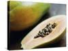 Papaya (Pawpaw) Sliced Open to Show Black Seeds-Lee Frost-Stretched Canvas