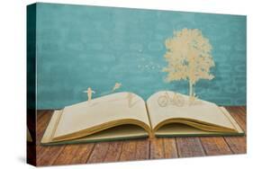 Paper Cut of Children Play on Old Book-jannoon028-Stretched Canvas