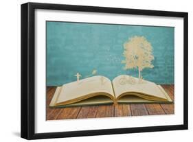 Paper Cut of Children Play on Old Book-jannoon028-Framed Photographic Print