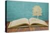 Paper Cut Of Children Read A Book Under Tree On Old Book-jannoon028-Stretched Canvas