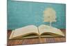 Paper Cut Of Children Read A Book Under Tree On Old Book-jannoon028-Mounted Art Print