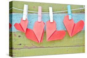 Paper Heart Hanging On The Clothesline. On Old Wood Background-tomgigabite-Stretched Canvas