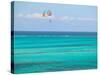 Para Sailing over Cable Beach, New Providence Island, Bahamas-Walter Bibikow-Stretched Canvas