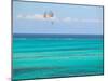 Para Sailing over Cable Beach, New Providence Island, Bahamas-Walter Bibikow-Mounted Photographic Print
