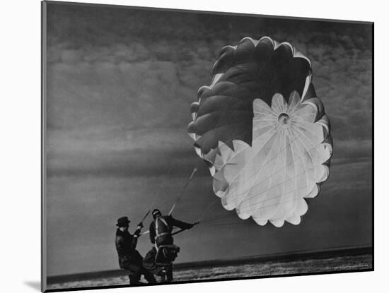 Parachute Jumper Testing Equipment for the Irving Air Chute Co. Gets Some Help-Margaret Bourke-White-Mounted Photographic Print