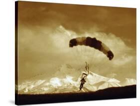 Parachutist with Mountain Background-null-Stretched Canvas