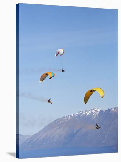 Paragliders Over Mountains, Queenstown, South Island, New Zealand-David Wall-Stretched Canvas