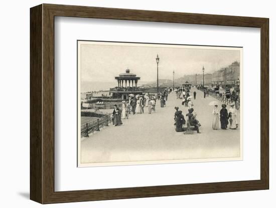 Parasols are Carried by Many Holidaymakers on the Promenade at Brighton-null-Framed Photographic Print