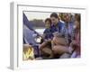 Parents And Their Children Sitting Around a Campfire Toasting Marshmallows-null-Framed Premium Photographic Print