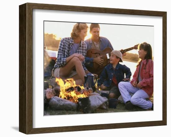 Parents And Their Children Sitting Around a Campfire-null-Framed Premium Photographic Print