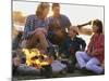 Parents And Their Children Sitting Around a Campfire-null-Mounted Photographic Print